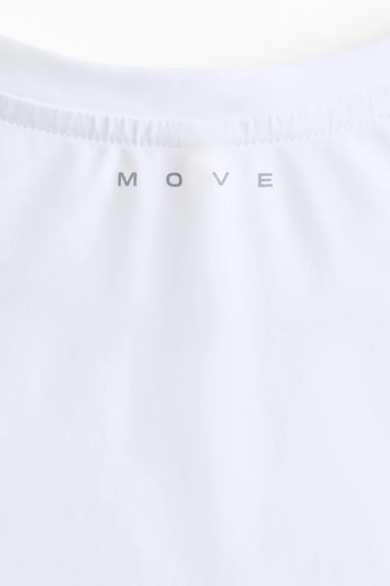 اتش اند ام تي‑شيرت للركض بخاصية التبريد وتقنية دراي موف™